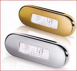 Hella Marine-2XT 959 680-811-LED OBLONG STEP LAMP WIDE RIM 10-33V WHITE - POLISHED 316 S/S BEZEL.